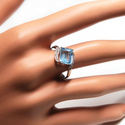 Комплект с голубым топазом 1121-ekm