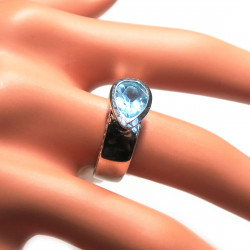 Комплект с голубым топазом 1283-ekm